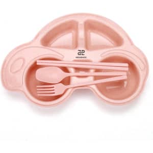 A pink, car-shaped toddler plate made from wheat straw, accompanied by a matching fork and spoon set.