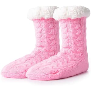 Pink mid tube fleece non-slip floor socks with a soft, fluffy white cuff, featuring a textured cable knit design.