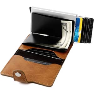 A vintage leather and metal credit card holder in brown, featuring slots for cards and a compartment for cash.