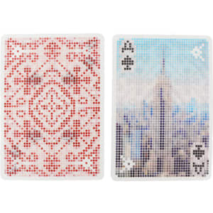 Custom PVC clear playing cards featuring a red patterned back and an illustrated Ace of Spades with a cityscape design.