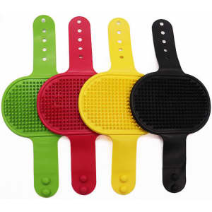 Four grooming brushes in green, red, yellow, and black, featuring textured surfaces and flexible handles.