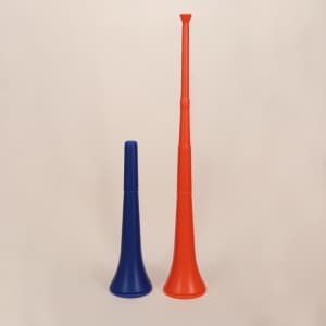 Two collapsible stadium horns, one in blue and the other in red, on a neutral background. Both feature logos.