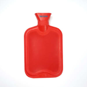 A red rubber hot water bag with a textured surface and a spout at the top, featuring a logo.