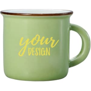 A green ceramic campfire mug with a rounded shape and a contrasting rim, featuring space for custom designs.