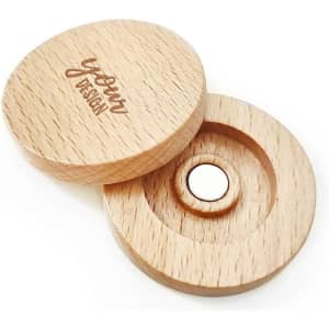 A wooden 20mm golf ball marker with a magnet, featuring a light wood finish and a logo.