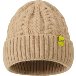 A tan cable knit beanie featuring a folded ribbed brim and a small logo tag.