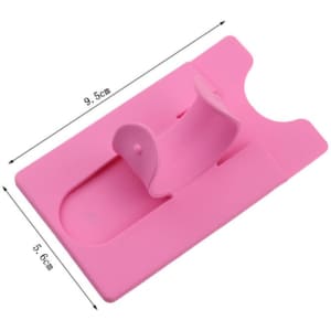 A pink silicone card holder with a built-in phone stand, measuring 9.5 cm by 5.6 cm.