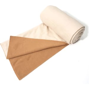 A rolled double-sided scarf featuring beige on one side and warm brown on the other, with a subtle texture.