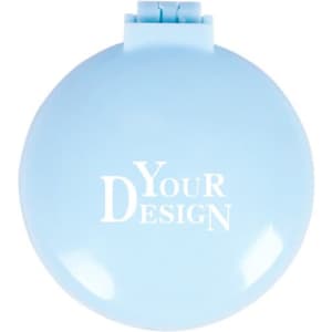 A light blue plastic folding massage comb with a mirror, featuring a logo on the front.