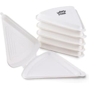 A stack of white biodegradable pizza boxes shaped like triangles, featuring a logo on one box.