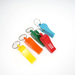 A set of five plastic whistles in red, yellow, green, orange, and blue, each with a keyring attachment.