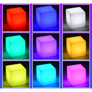 A large cube featuring multiple colour options, including red, blue, green, purple, yellow, and white. It has a remote control.