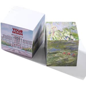 A custom sticky note cube featuring a design with colourful artwork on one side and a blank, white side.