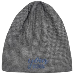 A grey slouchy beanie with a textured finish and a logo on the front.