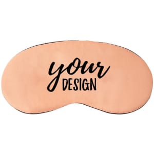 A peach sleep mask with an adjustable strap, featuring a logo and the text "your design" in black.