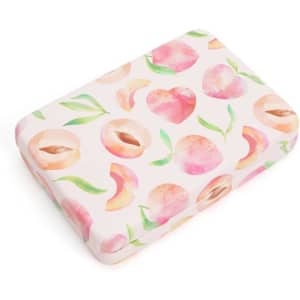 A travel jewelry box featuring a peach and leaf design in soft pink and white colours, with a mirror inside and a logo.