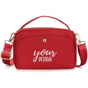 A red nylon crossbody bag with a zip closure, featuring a branded logo and an adjustable strap.
