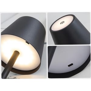 A custom LED table lamp in black, featuring a sleek design with a light source and a power button on the base.