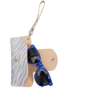A portable eyewear pouch with a blue and white zebra pattern, containing a pair of blue sunglasses.