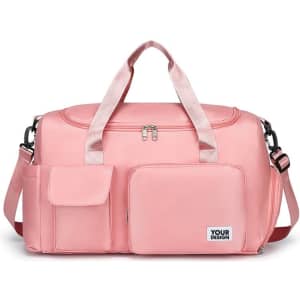 A pink multi-purpose sports duffle bag with two exterior pockets and a detachable shoulder strap.