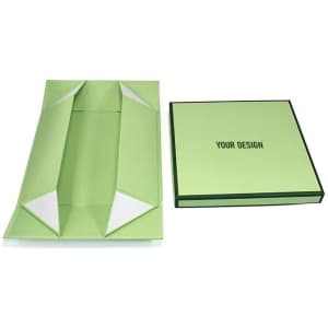 A square, green paper gift box with a lid, featuring a plain design and a branding logo.