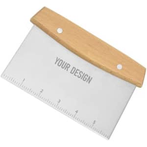 A stainless steel griddle scraper with a wooden handle, featuring a ruler edge and a logo.