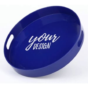 A round blue serving tray with handles and a text design in the centre.