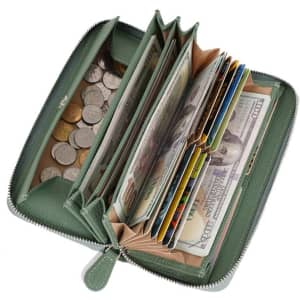 A green round fastener long wallet opened to reveal multiple compartments for bills, coins, and cards.