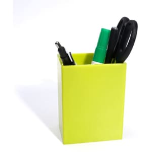 A bright yellow square pen holder containing pens, a marker, and scissors. It has a simple design and a logo.