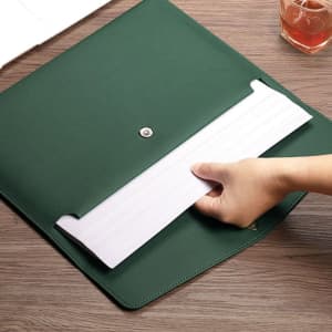 A green PU leather A4 document file folder with a hand inserting a document. Features a logo on the front.