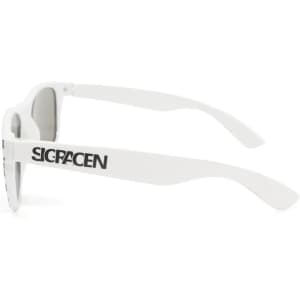 A pair of sunglasses with a black frame and white checkered pattern, featuring a logo on the side.