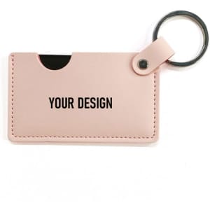 A pink PU leather keyring holder featuring a slot for a credit card and a round keyring attachment.