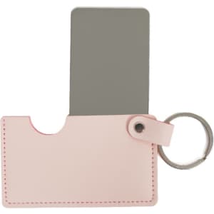 A pink PU leather holder with a rotating mirror and a keyring attached.