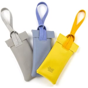 A set of three PVC leather glasses storage bags in grey, blue, and yellow, each with a looped strap and a logo.