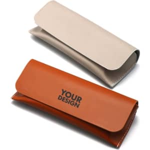 A beige and brown PU flip top glasses case, featuring a logo on the brown case, stacked on top of each other.