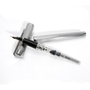 A silver fountain pen with a transparent ink converter and a matching cap rests on a white background.