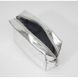 A silver square PU leather cosmetic bag with a zip closure and a spacious interior. It features a smooth finish and has a logo.