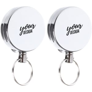 A retractable badge holder reel featuring a silver finish with a white circular casing and a keyring attachment.