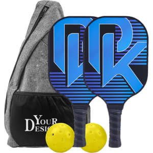 A grey portable sling bag with two blue pickleball paddles and two yellow balls. Includes a logo on the bag.