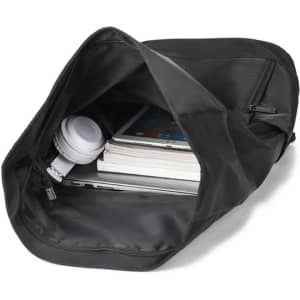 A black men's business laptop backpack with a laptop, books, and headphones visible inside.