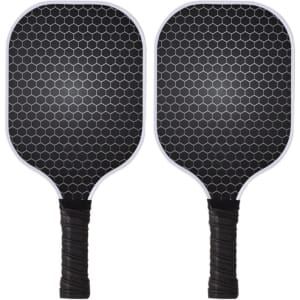 A set of two black fiberglass pickleball paddles with a honeycomb design and black grips.
