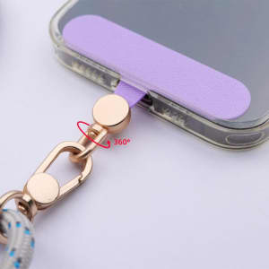 A lavender cell phone lanyard patch with a gold clasp features a 360-degree swivel connection.