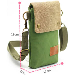 A green canvas shoulder bag with a tan flap, featuring an adjustable strap and a small brown patch.