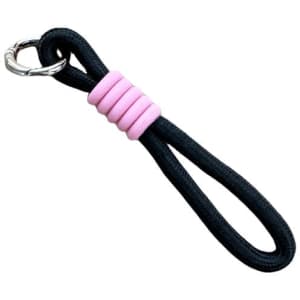 A black double layer wrist lanyard keyring with pink beads and a silver clip.