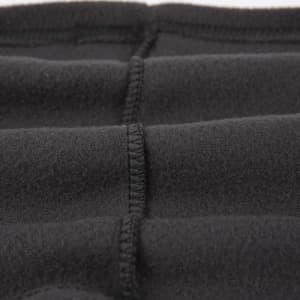 A black multifunctional neck gaiter with visible stitching details. It has a soft, textured fabric.
