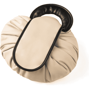 A beige drawstring makeup bag with a black handle, featuring a textured, gathered design.