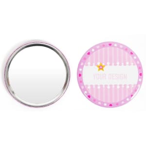A round tinplate pocket mirror with a pink and white design, featuring a shiny reflective surface on one side.