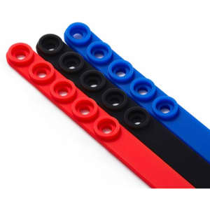 Custom adjustable silicone wristbands in red, black, and blue, featuring hole adjustment points and branding.
