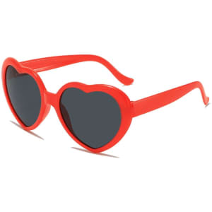 Red heart-shaped sunglasses with dark lenses and a logo on the side. Ideal for leisure and outdoor activities.