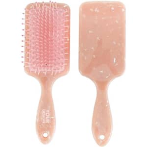 A paddle detangler hair brush featuring a pink bristle design and a marbled light pink handle. It includes a logo.